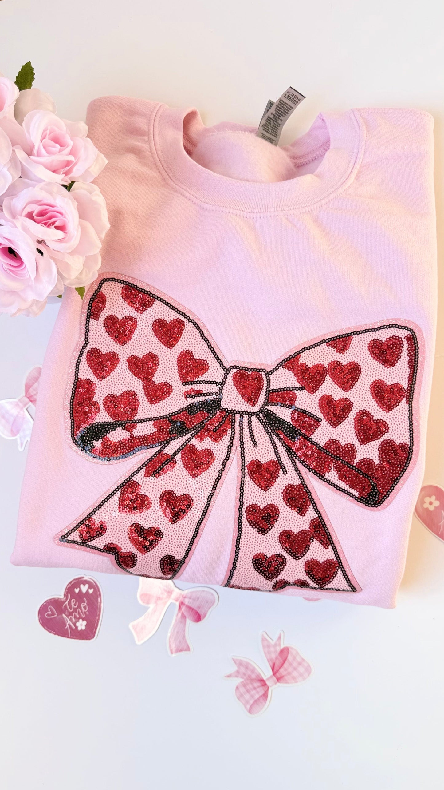 Pink Sweatshirt with Bow Patch and Heart Accents